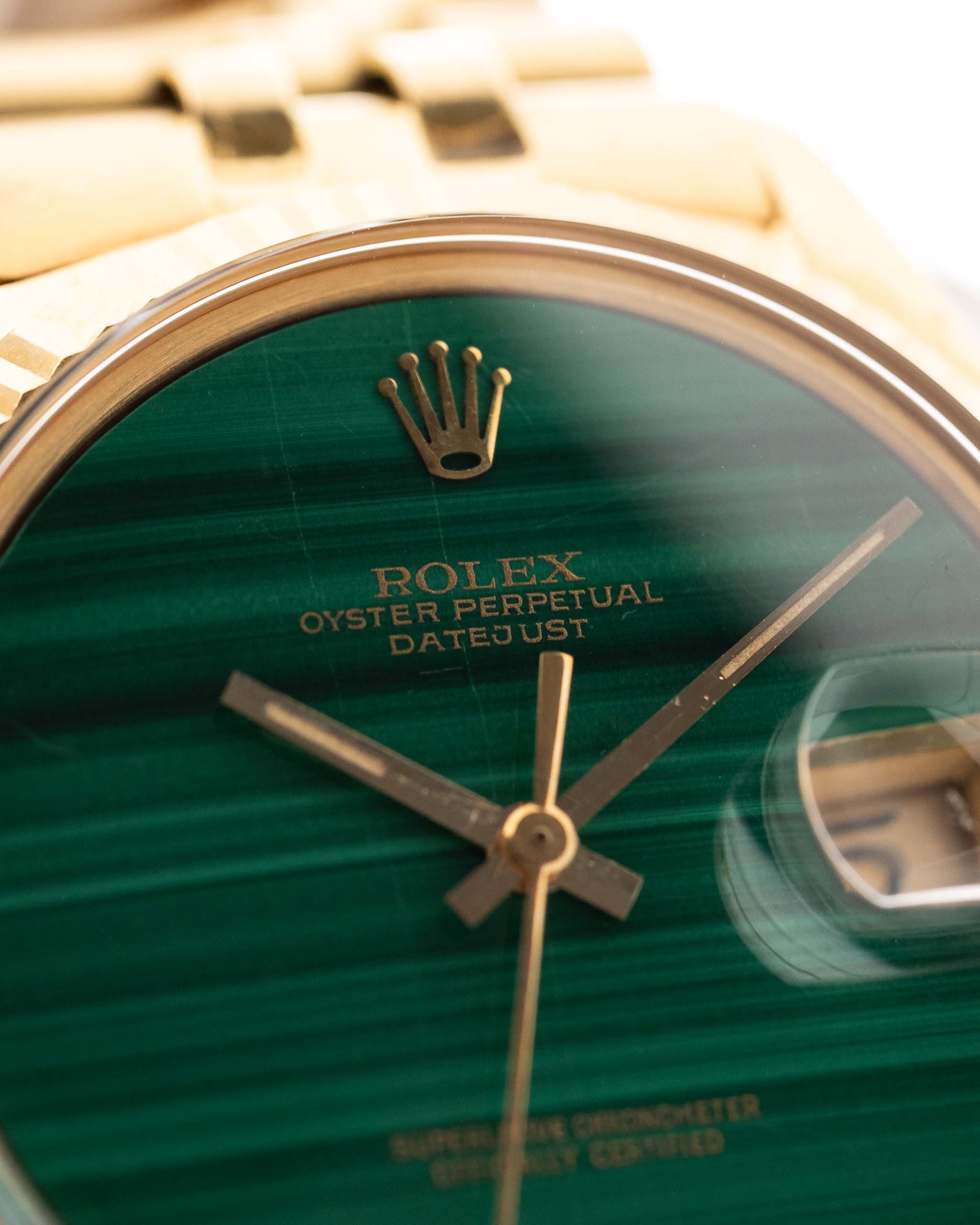 Closeup Photo of a Rolex 1601 Datejust 18k Malachite Dial. From 1968, 36mm in 18K Yellow Gold with Original Malachite Dial, Automatic Caliber 1570 and Original Jubilee Bracelet.