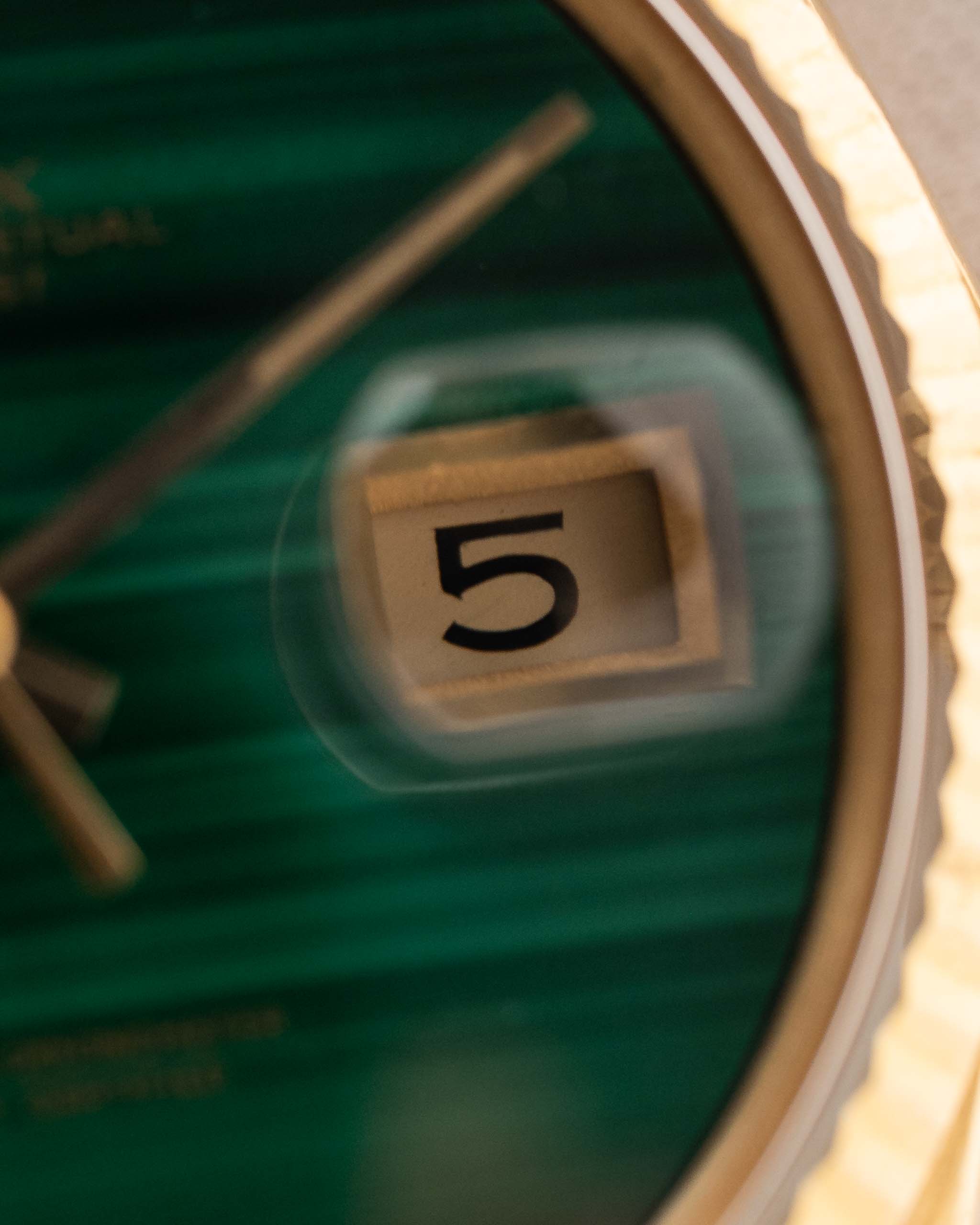 Closeup Photo of a Rolex 1601 Datejust 18k Malachite Dial. From 1968, 36mm in 18K Yellow Gold with Original Malachite Dial, Automatic Caliber 1570 and Original Jubilee Bracelet.