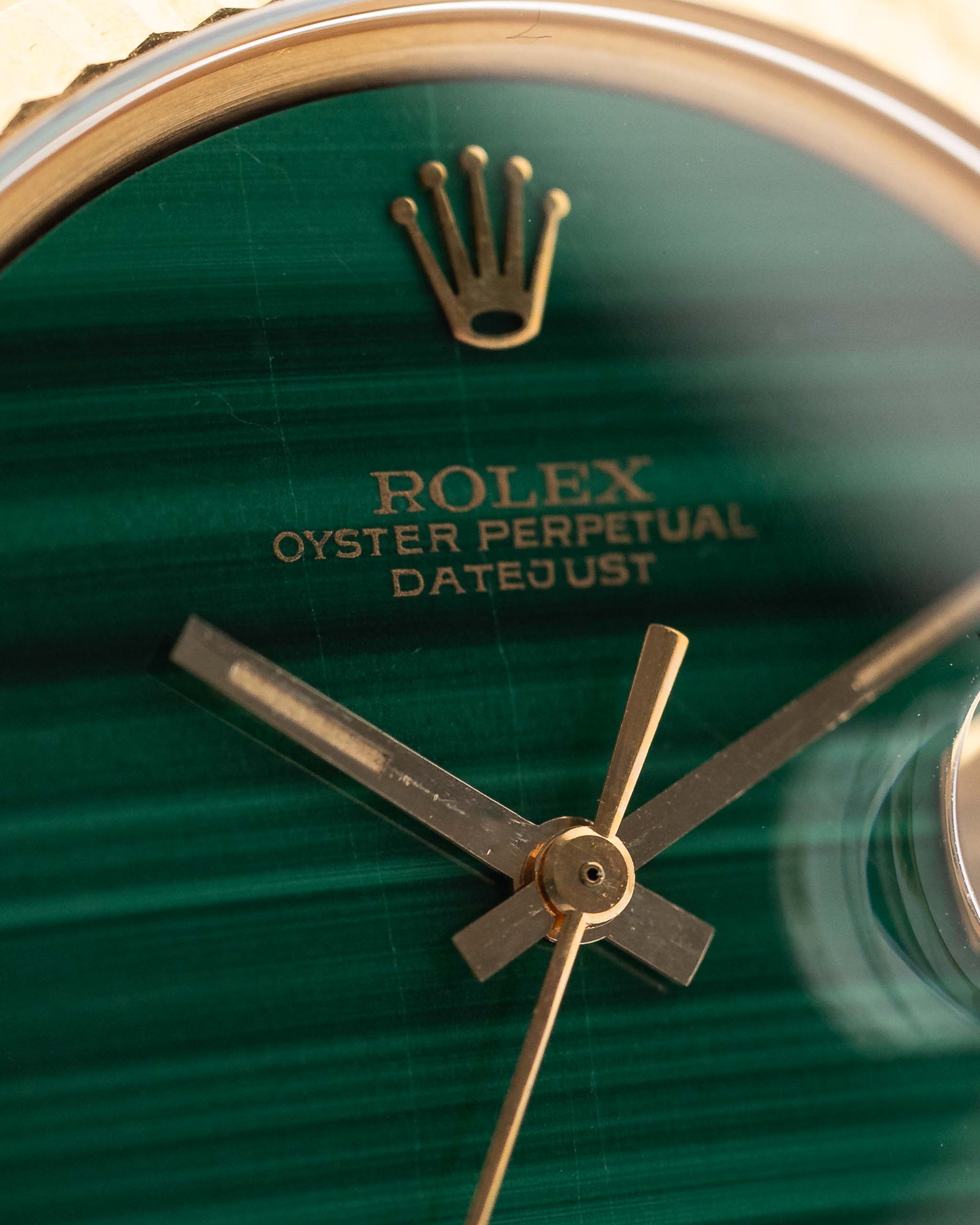 Closeup Photo of a Rolex 1601 Datejust 18k Malachite Dial. From 1968, 36mm in 18K Yellow Gold with Original Malachite Dial, Automatic Caliber 1570 and Original Jubilee Bracelet.