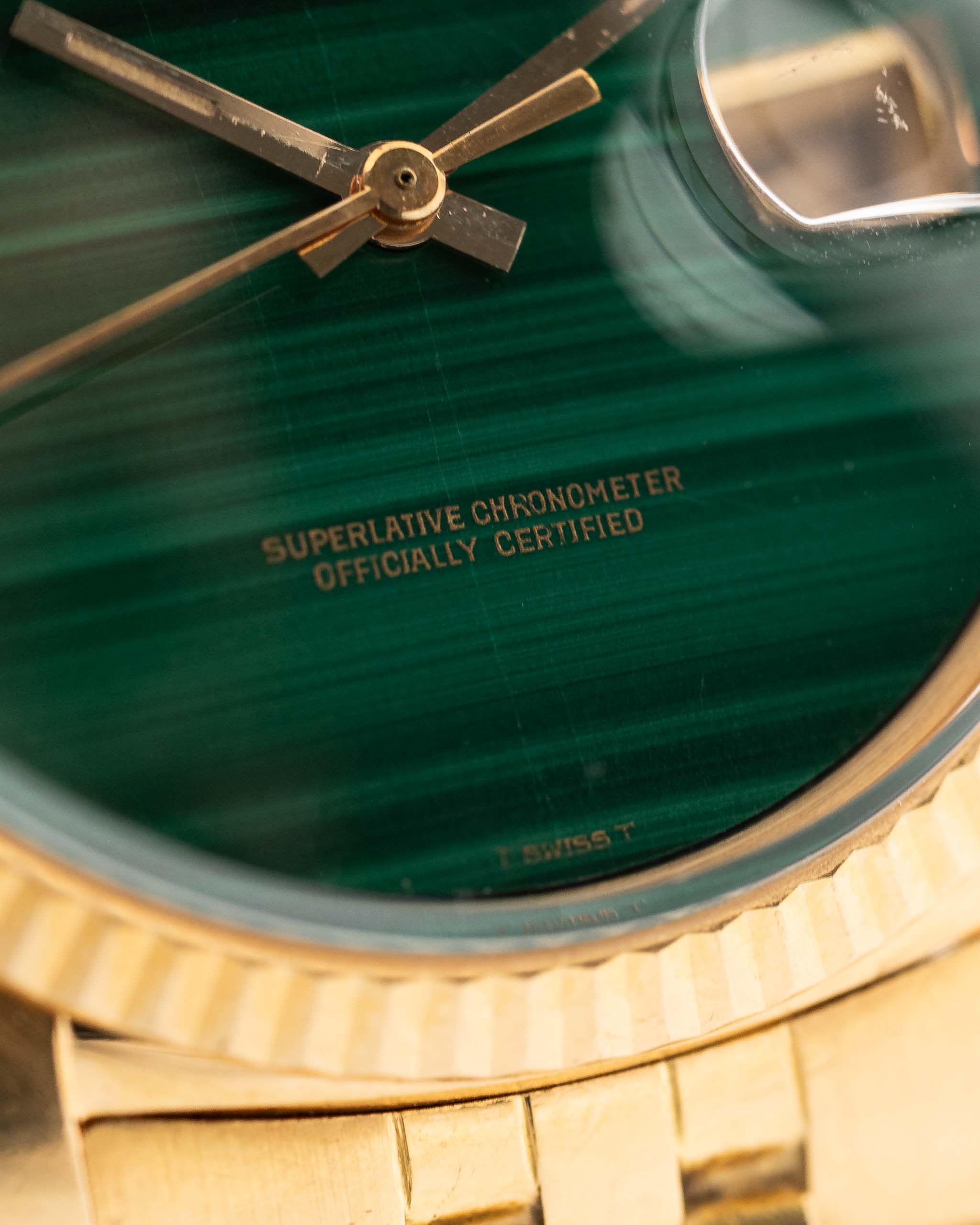 Closeup Photo of a Rolex 1601 Datejust 18k Malachite Dial. From 1968, 36mm in 18K Yellow Gold with Original Malachite Dial, Automatic Caliber 1570 and Original Jubilee Bracelet.