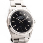 Vintage Rolex Air King 14000 Watch Black from 1999. 34mm in Stainless Steel with Automatic Caliber 3130, Flawless black dial and Rolex Oyster bracelet.