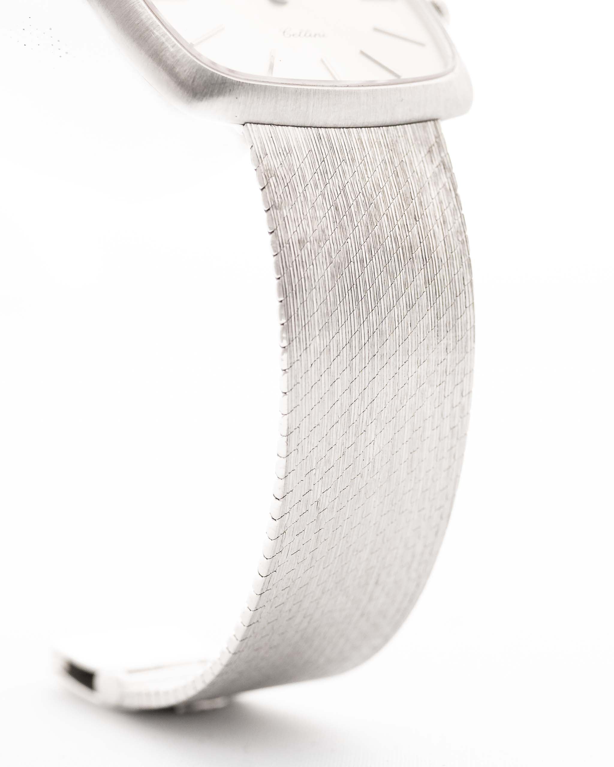 Closeup Photo of a Rolex Cellini 3805 Square 18k from 1970. 31.5mm in 18k White Gold with Manual Wind Movement, Original Silver Sunburst Dial and White Gold Bracelet.