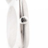 Closeup Photo of a Rolex Cellini 3805 Square 18k from 1970. 31.5mm in 18k White Gold with Manual Wind Movement, Original Silver Sunburst Dial and White Gold Bracelet.
