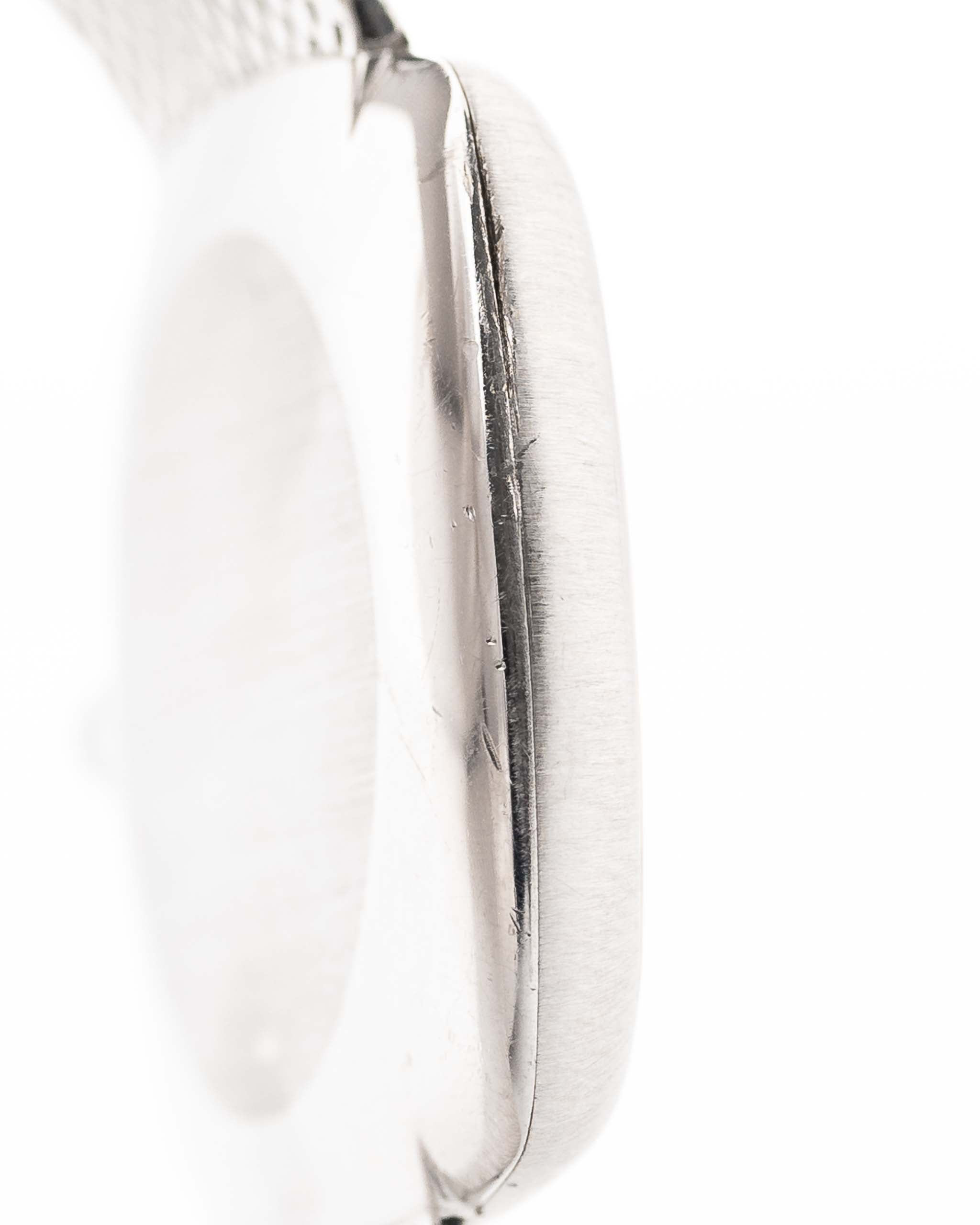 Closeup Photo of a Rolex Cellini 3805 Square 18k from 1970. 31.5mm in 18k White Gold with Manual Wind Movement, Original Silver Sunburst Dial and White Gold Bracelet.