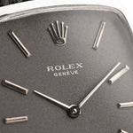 Vintage Rolex Cellini 3807 Tonneau 18k white gold dark grey dial closeup with markers hands and crown logo