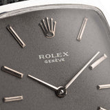 Vintage Rolex Cellini 3807 Tonneau 18k white gold dark grey dial closeup with markers hands and crown logo