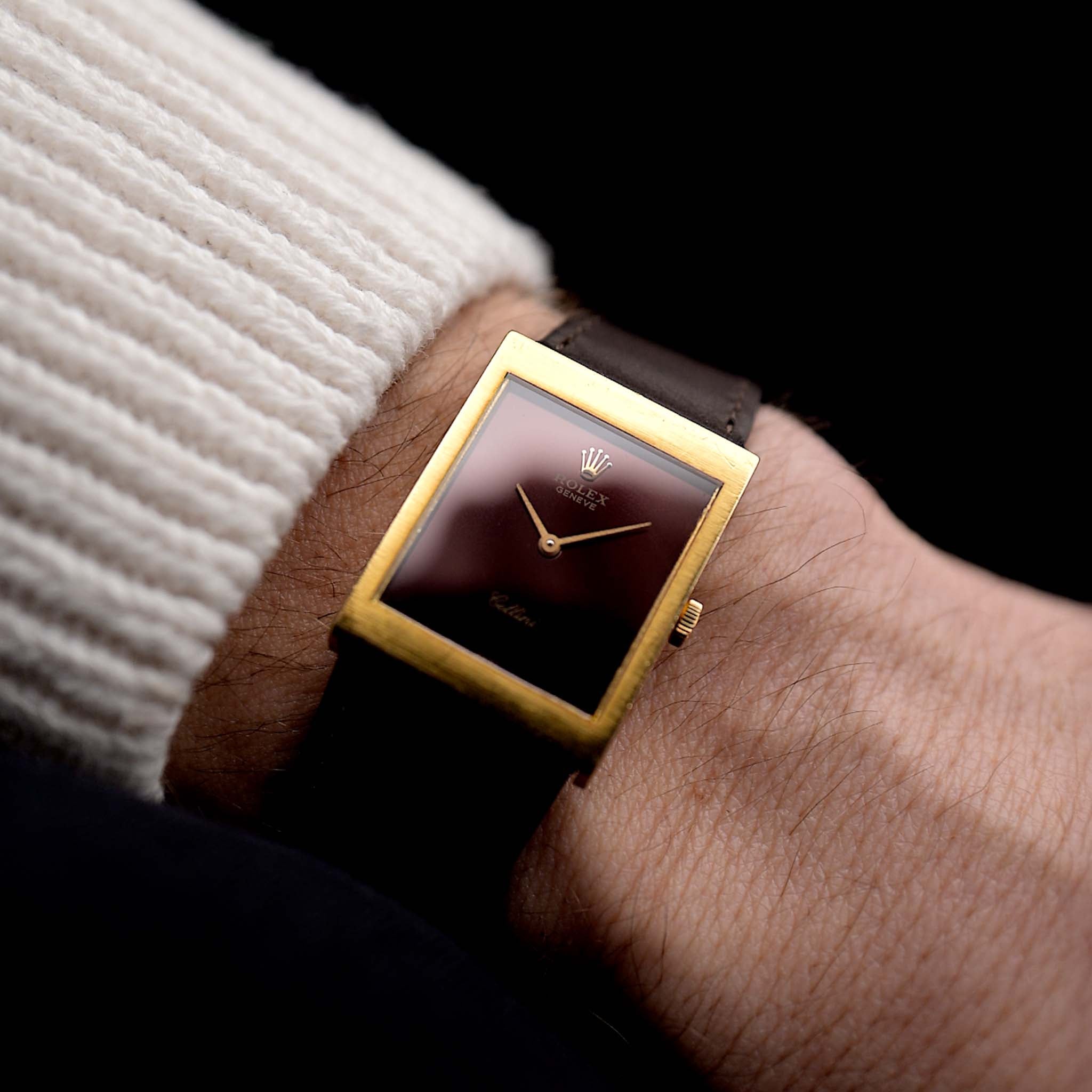 Photo of a Rolex Cellini 4014 Burgundy from 1972 on a wrist. 18k yellow gold case, 22.5mm with Burgundy dial, Manual movement, Original hands, Leather strap.