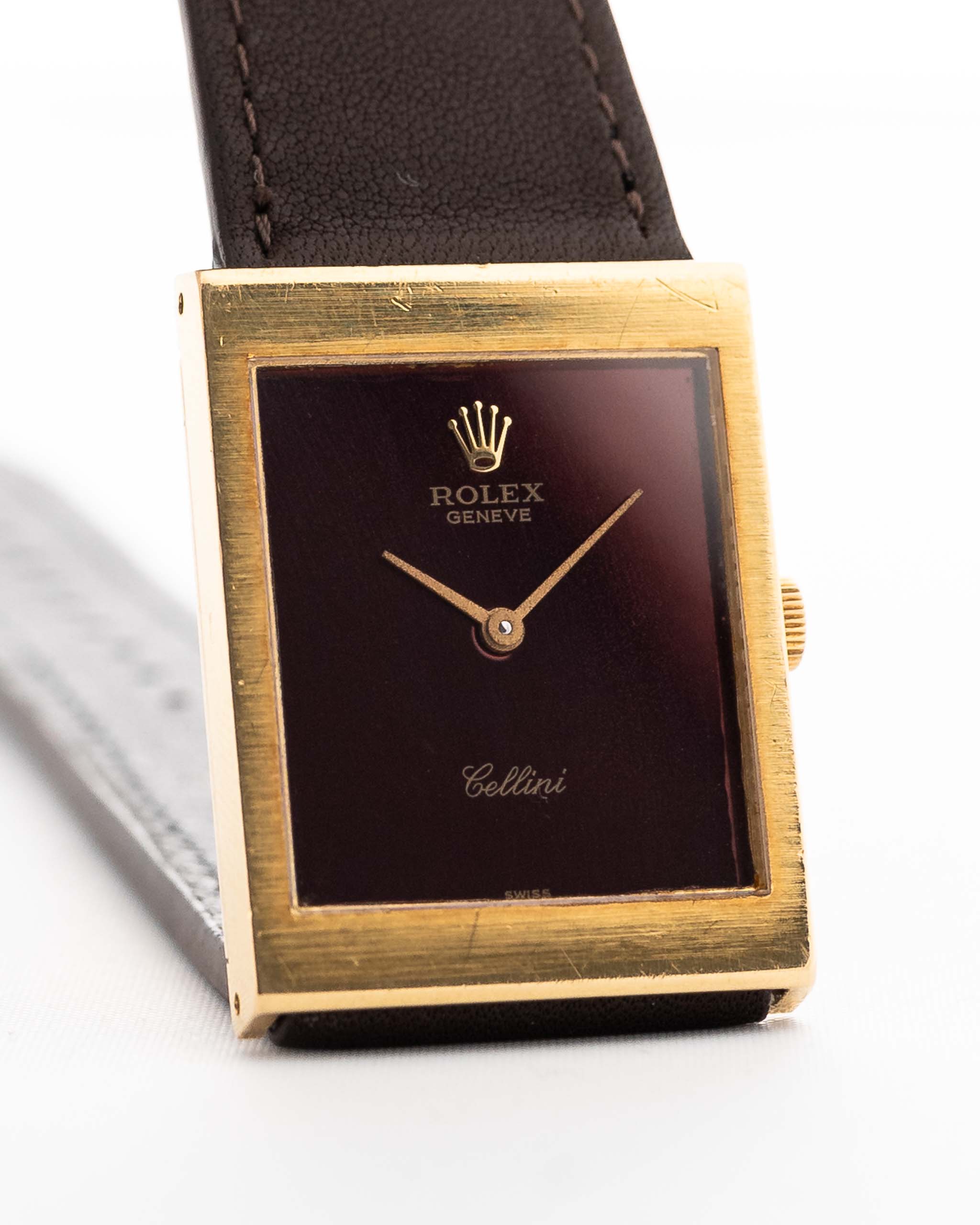 Closeup Photo of a Rolex Cellini 4014 Burgundy from 1972. 18k yellow gold case, 22.5mm with Burgundy dial, Manual movement, Original hands, Leather strap.