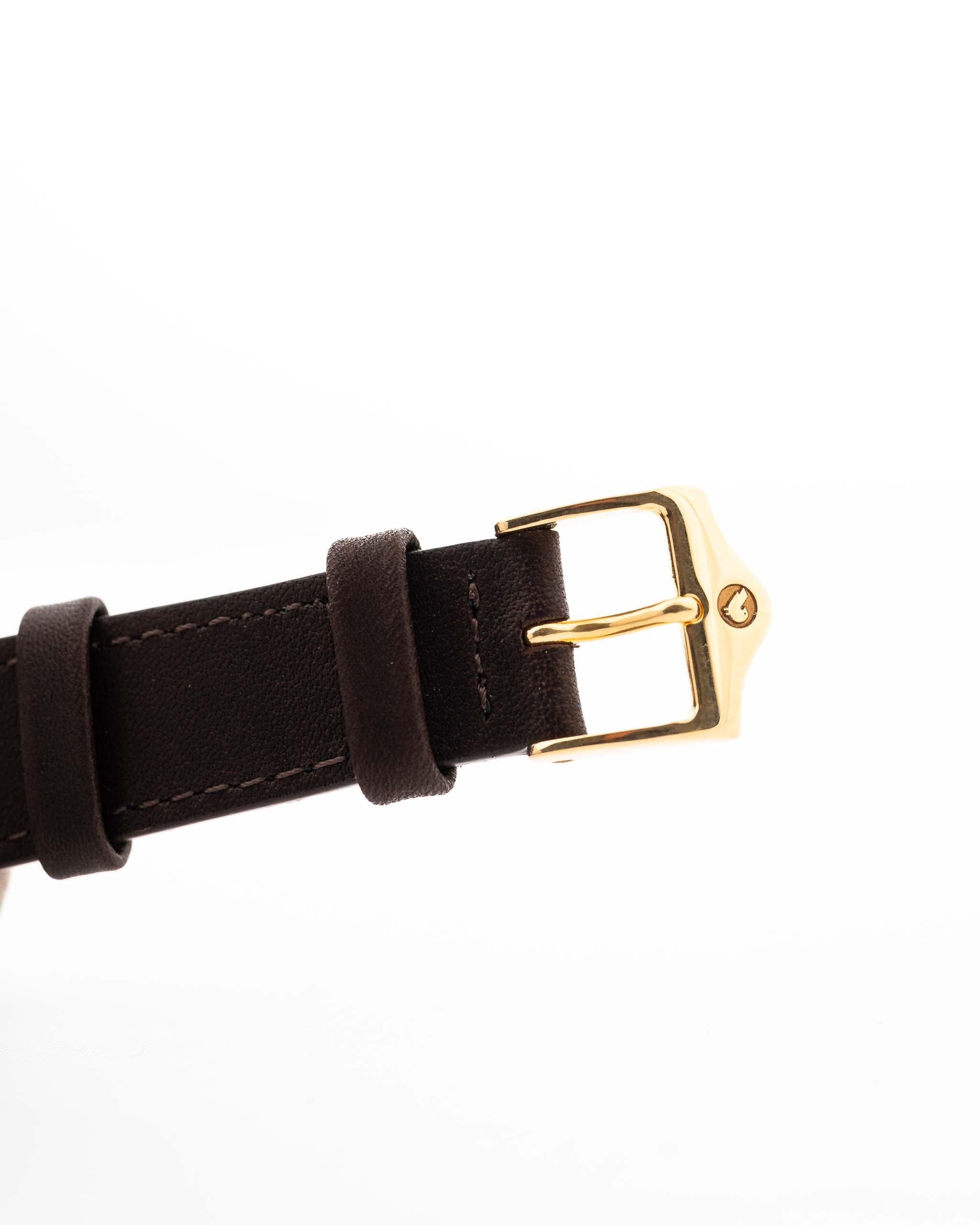 Closeup of a Vintage Rolex Cellini 4083 Ombre from 1973. 33mm with 18k Yellow Gold Case, Manual Wind Movement, Original Brown Ombre Dial and Leather Strap.