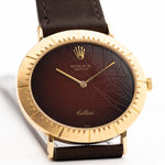 Closeup of a Vintage Rolex Cellini 4083 Ombre from 1973 Brown Ombre Dial. 33mm with 18k Yellow Gold Case, Manual Wind Movement, Original Brown Ombre Dial and Leather Strap.