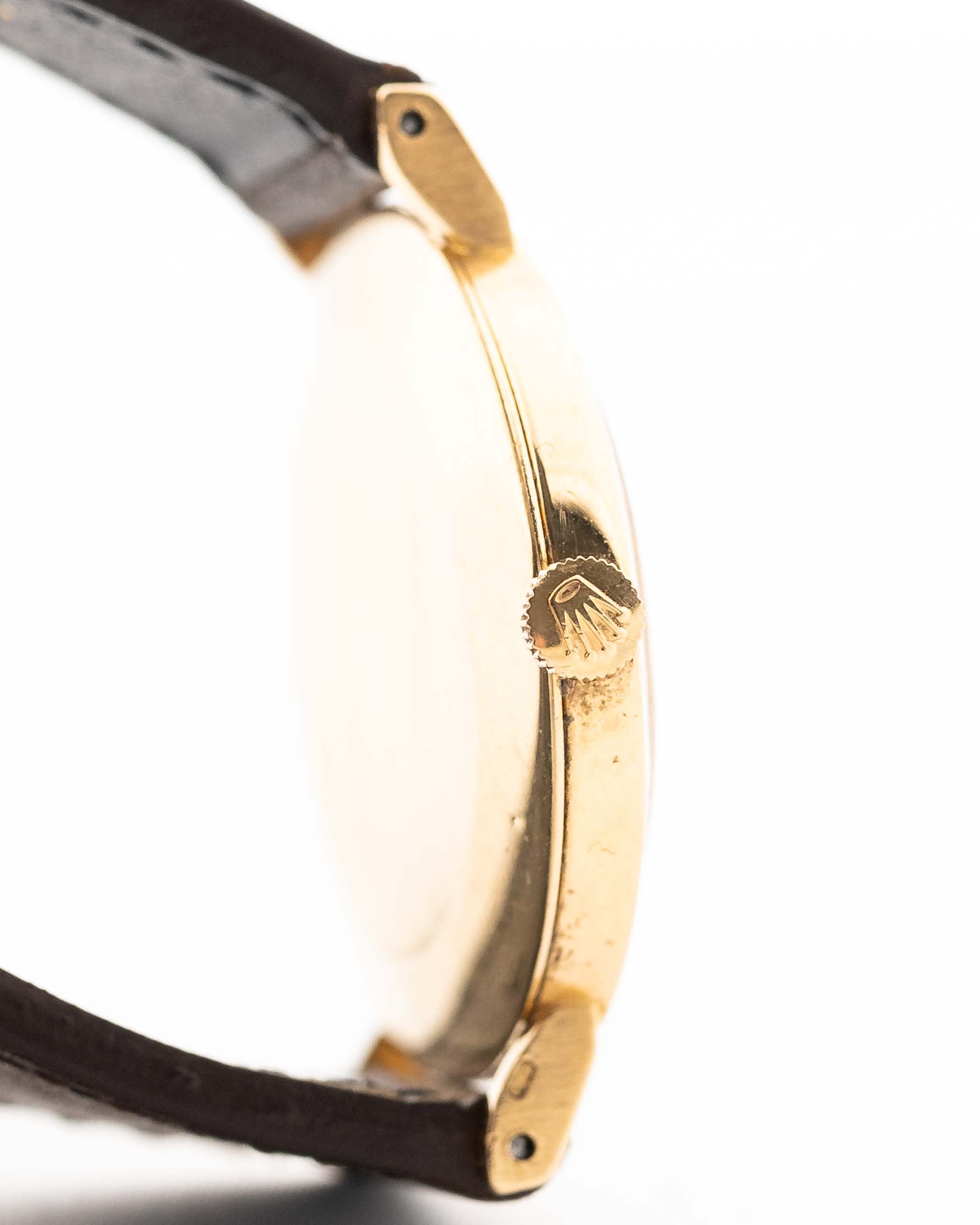 Closeup of a Vintage Rolex Cellini 4083 Ombre from 1973 Case. 33mm with 18k Yellow Gold Case, Manual Wind Movement, Original Brown Ombre Dial and Leather Strap.