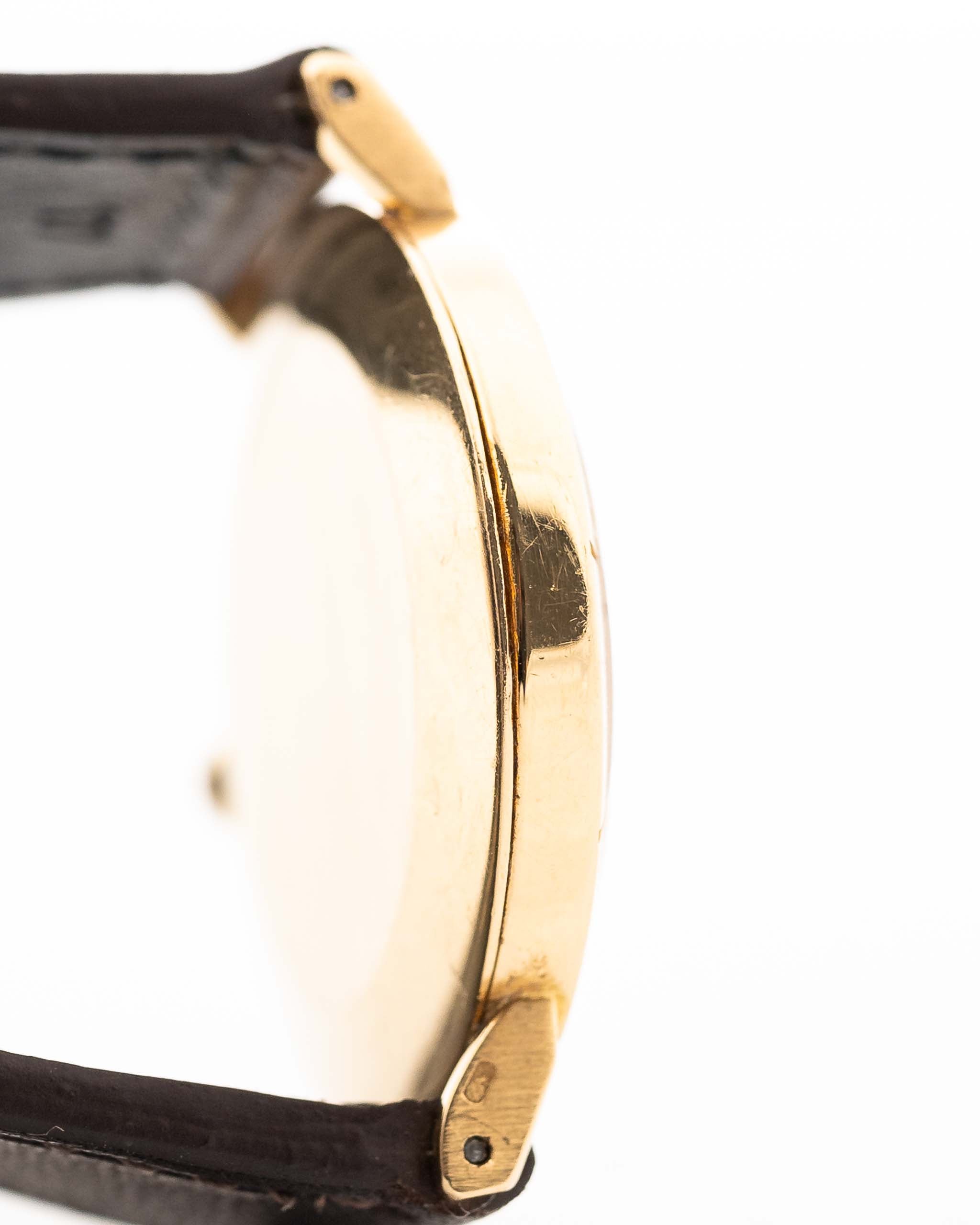 Closeup of a Vintage Rolex Cellini 4083 Ombre from 1973 Case. 33mm with 18k Yellow Gold Case, Manual Wind Movement, Original Brown Ombre Dial and Leather Strap.