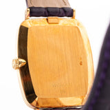 Closeup Photo of a Rolex Cellini 4087 Rectangular from 1995. 27.5mm in 18k Yellow Gold with Manual Wind Movement, Silver Sunburst Dial and Original Leather Strap.