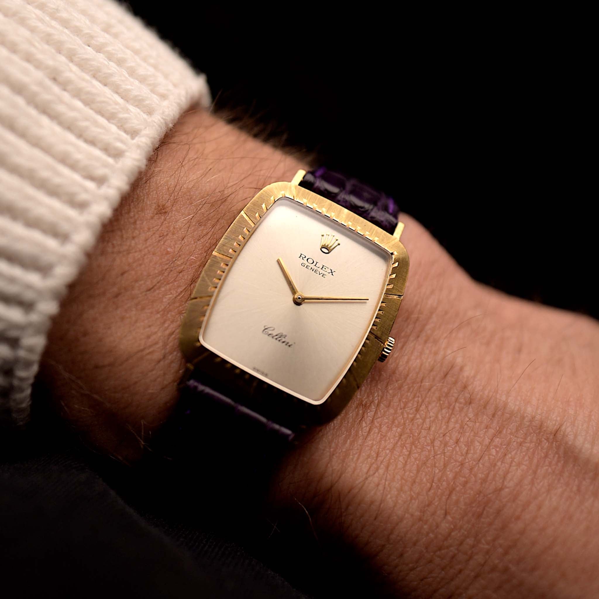 Photo of a Rolex Cellini 4087 Rectangular from 1995 on a wrist. 27.5mm in 18k Yellow Gold with Manual Wind Movement, Silver Sunburst Dial and Original Leather Strap.