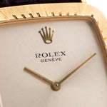 Closeup Photo of a Rolex Cellini 4087 Rectangular from 1995. 27.5mm in 18k Yellow Gold with Manual Wind Movement, Silver Sunburst Dial and Original Leather Strap.