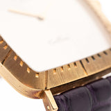 Closeup Photo of a Rolex Cellini 4087 Rectangular from 1995. 27.5mm in 18k Yellow Gold with Manual Wind Movement, Silver Sunburst Dial and Original Leather Strap.