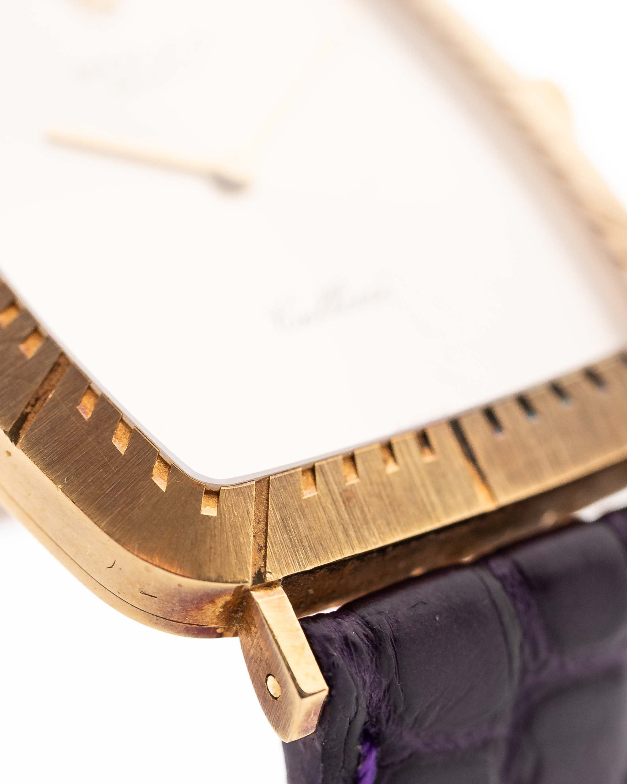 Closeup Photo of a Rolex Cellini 4087 Rectangular from 1995. 27.5mm in 18k Yellow Gold with Manual Wind Movement, Silver Sunburst Dial and Original Leather Strap.