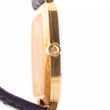 Closeup Photo of a Rolex Cellini 4087 Rectangular from 1995. 27.5mm in 18k Yellow Gold with Manual Wind Movement, Silver Sunburst Dial and Original Leather Strap.