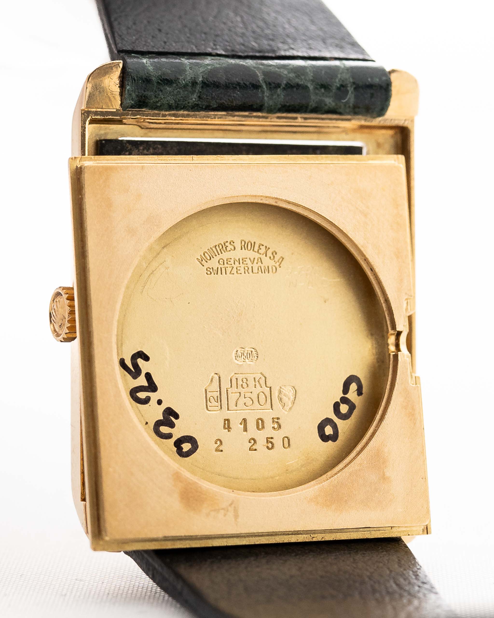 Closeup Photo of a Rolex Cellini 4105 Rectangular Black from 1976. 25.5mm  18k yellow gold case with Manual wind movement, Original black tapestry dial and Leather strap.