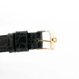 Closeup Photo of a Rolex Cellini 4105 Rectangular Black from 1976. 25.5mm  18k yellow gold case with Manual wind movement, Original black tapestry dial and Leather strap.