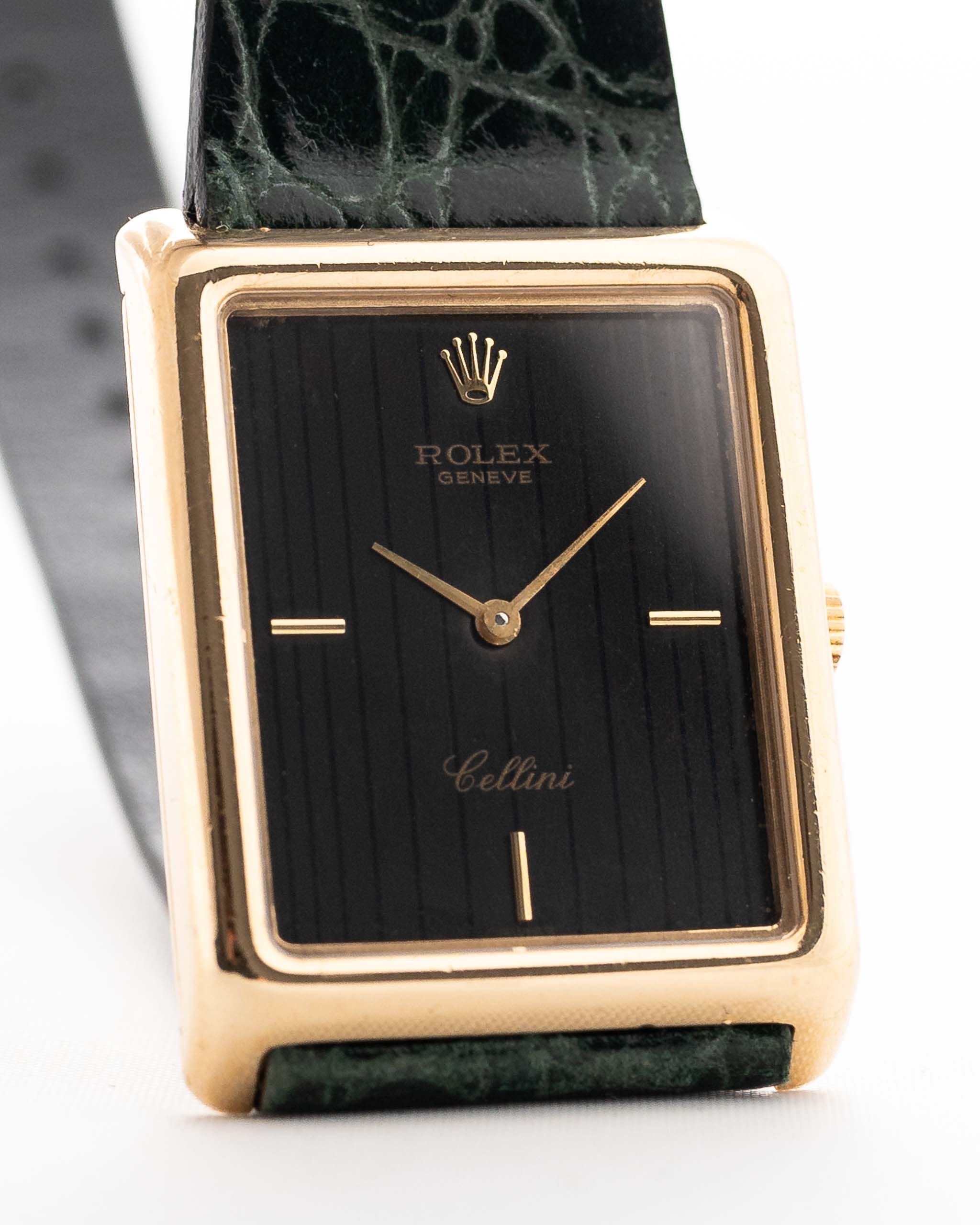 Closeup Photo of a Rolex Cellini 4105 Rectangular Black from 1976. 25.5mm  18k yellow gold case with Manual wind movement, Original black tapestry dial and Leather strap.