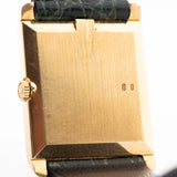Closeup Photo of a Rolex Cellini 4105 Rectangular Black from 1976. 25.5mm  18k yellow gold case with Manual wind movement, Original black tapestry dial and Leather strap.