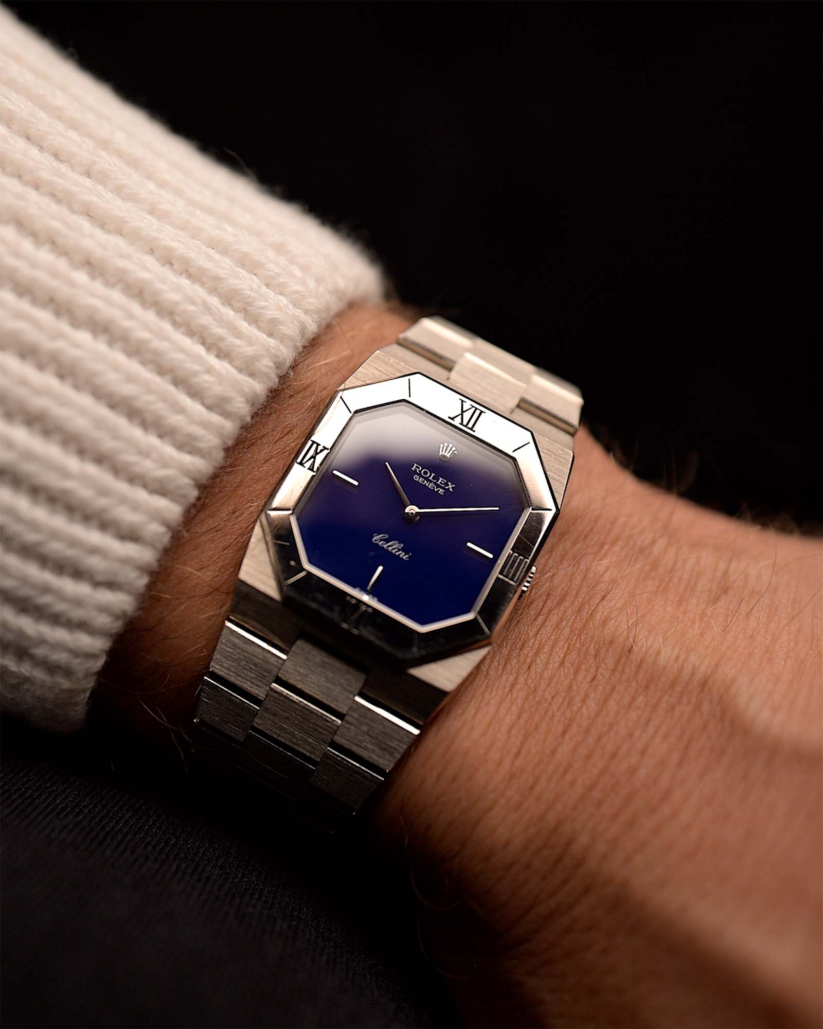Vintage Rolex Cellini 4350 Octagon Blue Watch from 1983 on a wrist. 27mm with 18k White Gold Case, Royal Blue Dial, 18k White Gold President Bracelet and Manual-wound Caliber 1601.