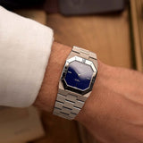 Vintage Rolex Cellini 4350 Octagon Blue Watch from 1983 on a wrist. 18k White Gold Case, Royal Blue Dial, 18k White Gold President Bracelet and Manual-wound Caliber 1601.