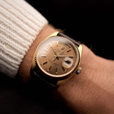 Rolex Day-Date 18038 vintage watch, 18k yellow gold, Havana dial, fluted bezel, worn on the wrist