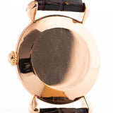 Closeup Photo of a Vacheron Constantin 18k Rosé Teardrop from the 1940s. 30mm 18k Rose Gold Case with Manual Wind Movement, Original Gold Dial and Leather Strap.