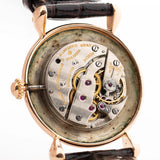 Closeup Photo of a Vacheron Constantin 18k Rosé Teardrop from the 1940s. 30mm 18k Rose Gold Case with Manual Wind Movement, Original Gold Dial and Leather Strap.