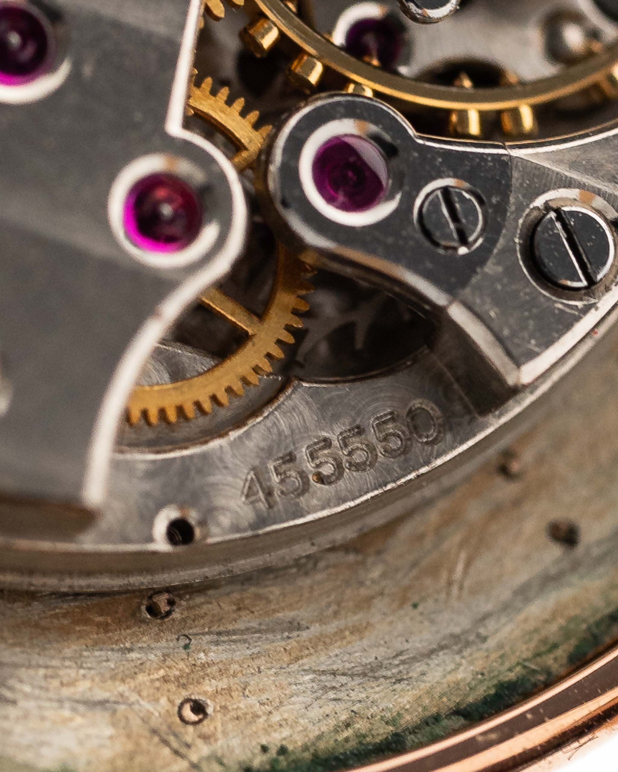 Closeup Photo of a Vacheron Constantin 18k Rosé Teardrop from the 1940s. 30mm 18k Rose Gold Case with Manual Wind Movement, Original Gold Dial and Leather Strap.