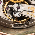 Closeup Photo of a Vacheron Constantin 18k Rosé Teardrop from the 1940s. 30mm 18k Rose Gold Case with Manual Wind Movement, Original Gold Dial and Leather Strap.
