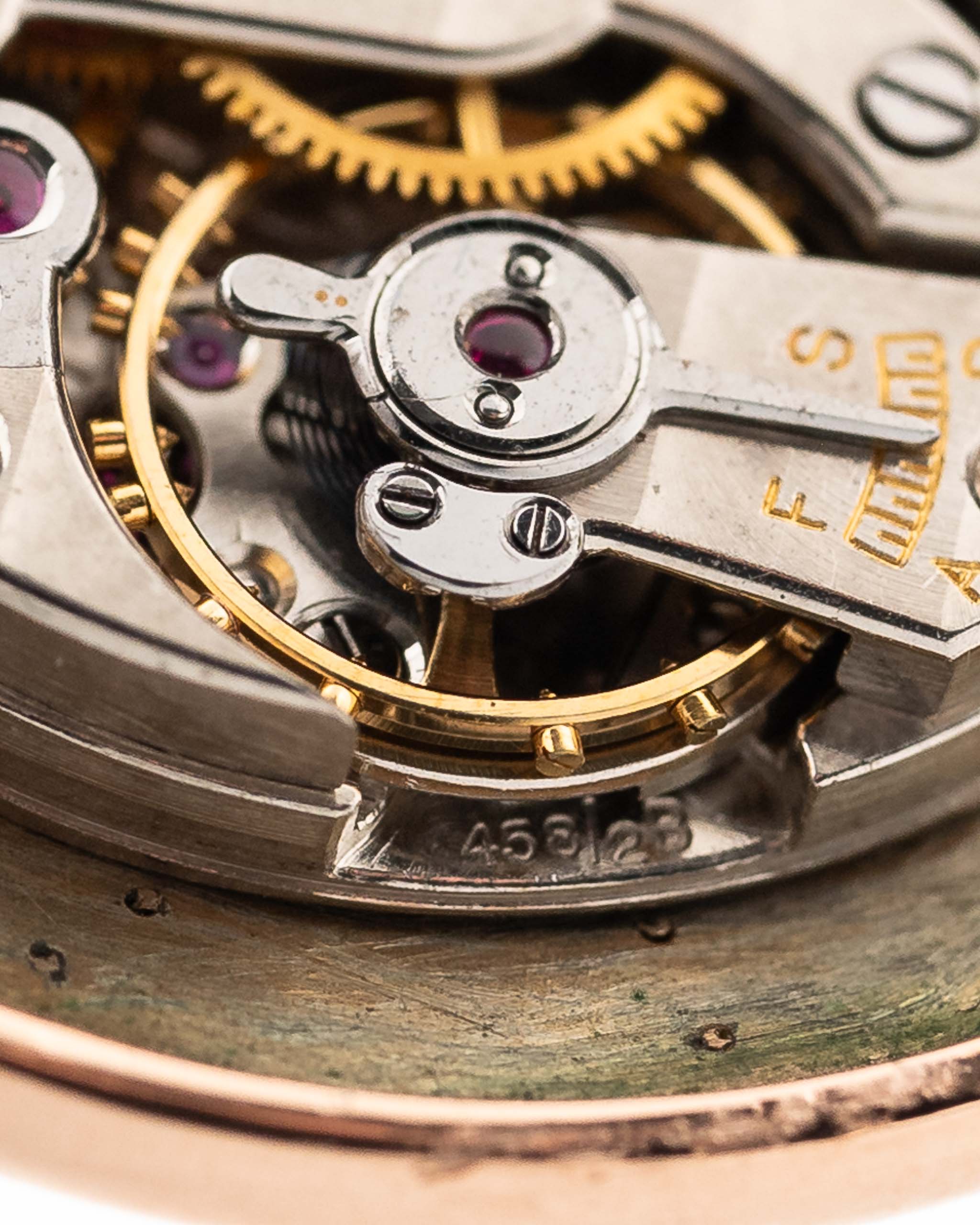 Closeup Photo of a Vacheron Constantin 18k Rosé Teardrop from the 1940s. 30mm 18k Rose Gold Case with Manual Wind Movement, Original Gold Dial and Leather Strap.