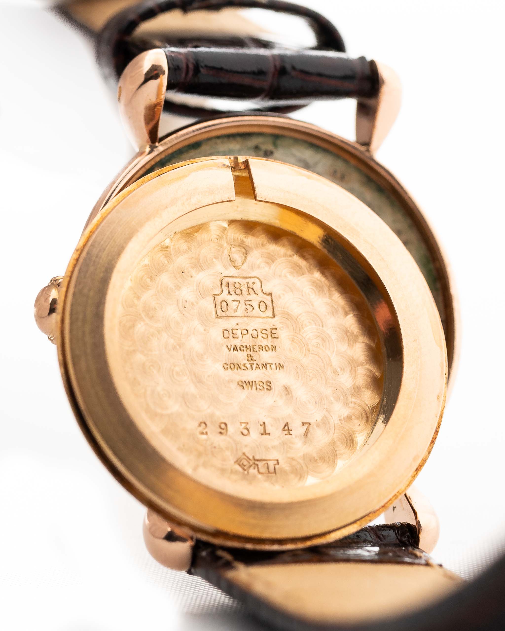 Closeup Photo of a Vacheron Constantin 18k Rosé Teardrop from the 1940s. 30mm 18k Rose Gold Case with Manual Wind Movement, Original Gold Dial and Leather Strap.