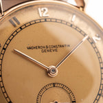 Closeup Photo of a Vacheron Constantin 18k Rosé Teardrop from the 1940s. 30mm 18k Rose Gold Case with Manual Wind Movement, Original Gold Dial and Leather Strap.