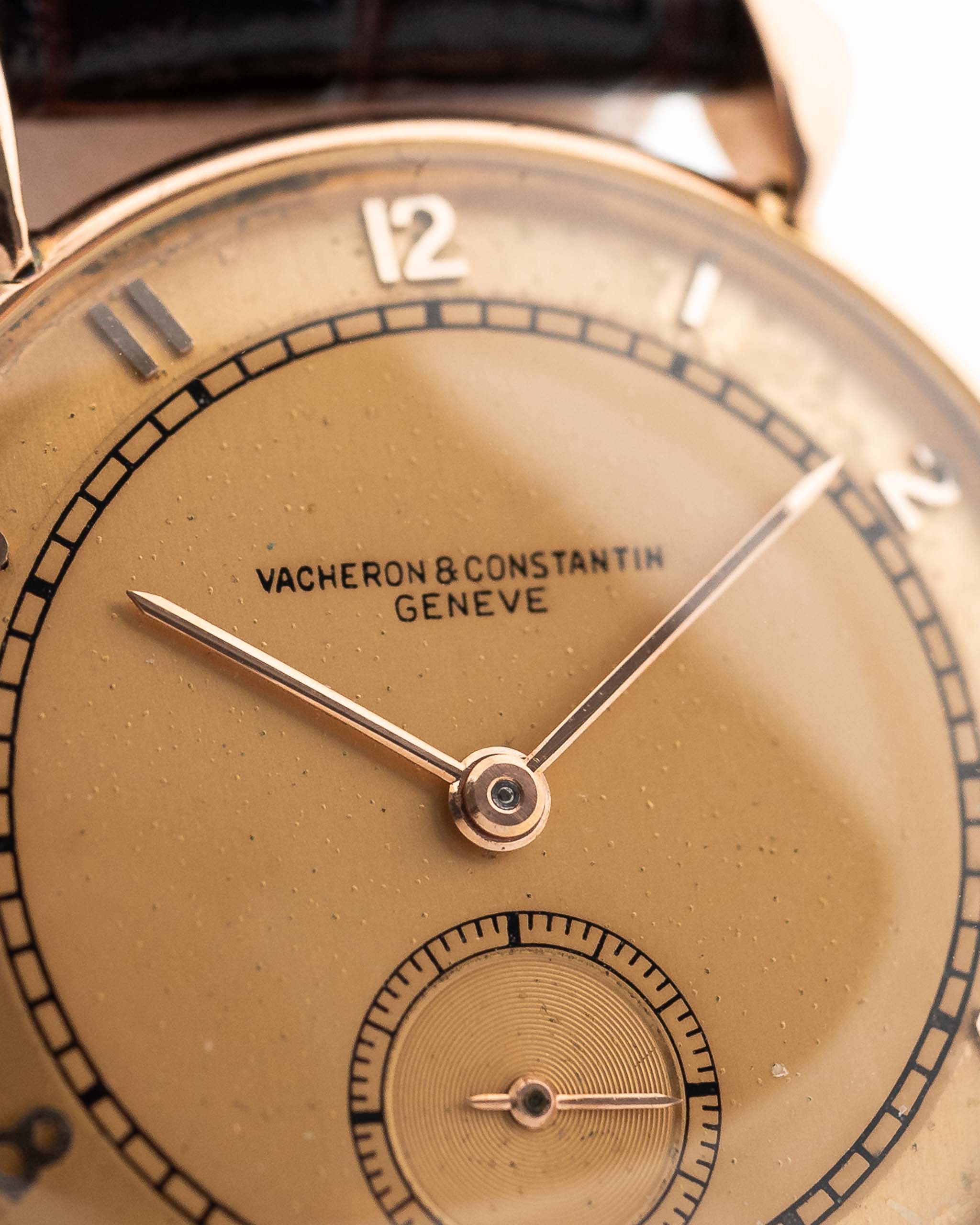 Closeup Photo of a Vacheron Constantin 18k Rosé Teardrop from the 1940s. 30mm 18k Rose Gold Case with Manual Wind Movement, Original Gold Dial and Leather Strap.