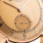 Closeup Photo of a Vacheron Constantin 18k Rosé Teardrop from the 1940s. 30mm 18k Rose Gold Case with Manual Wind Movement, Original Gold Dial and Leather Strap.