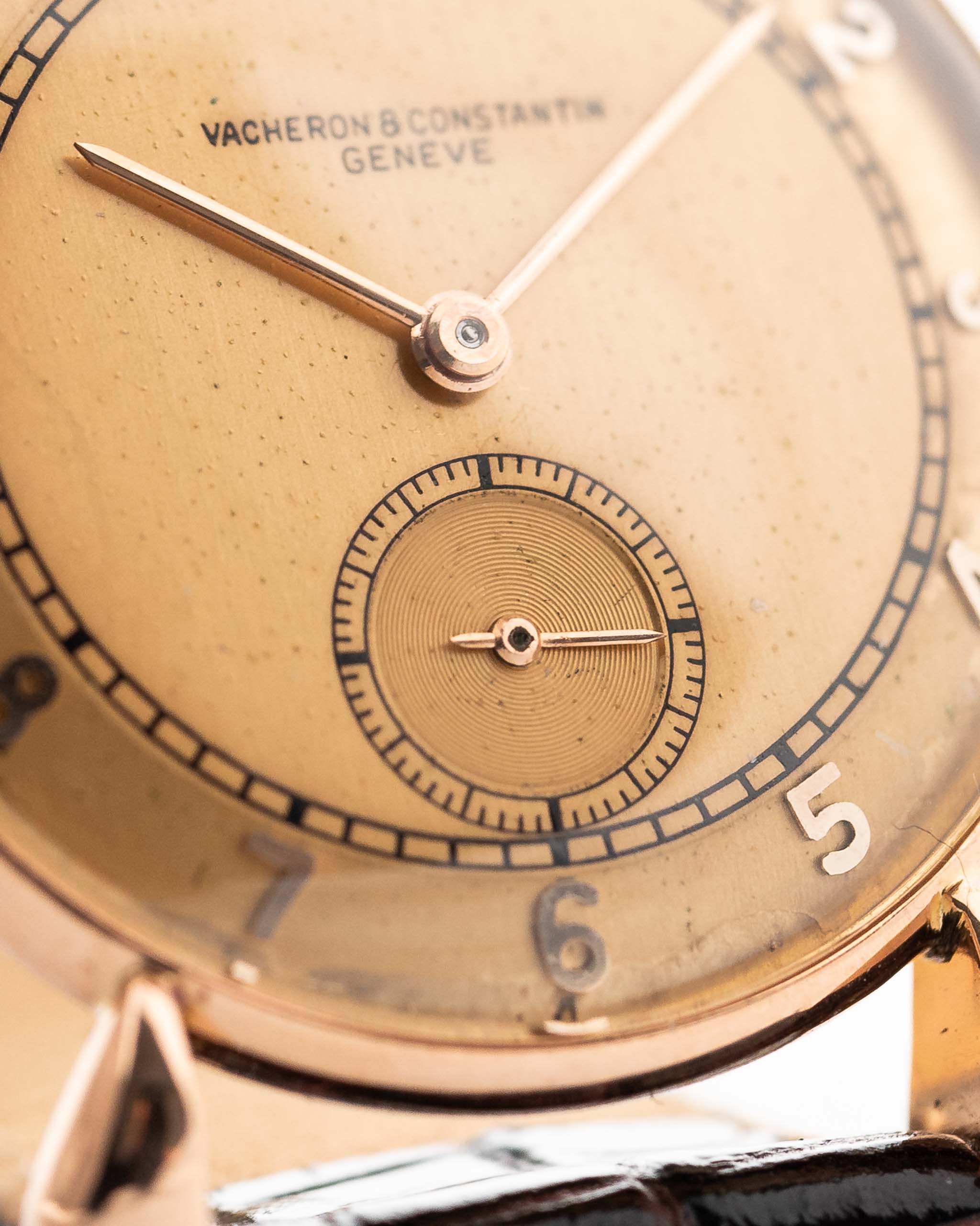 Closeup Photo of a Vacheron Constantin 18k Rosé Teardrop from the 1940s. 30mm 18k Rose Gold Case with Manual Wind Movement, Original Gold Dial and Leather Strap.