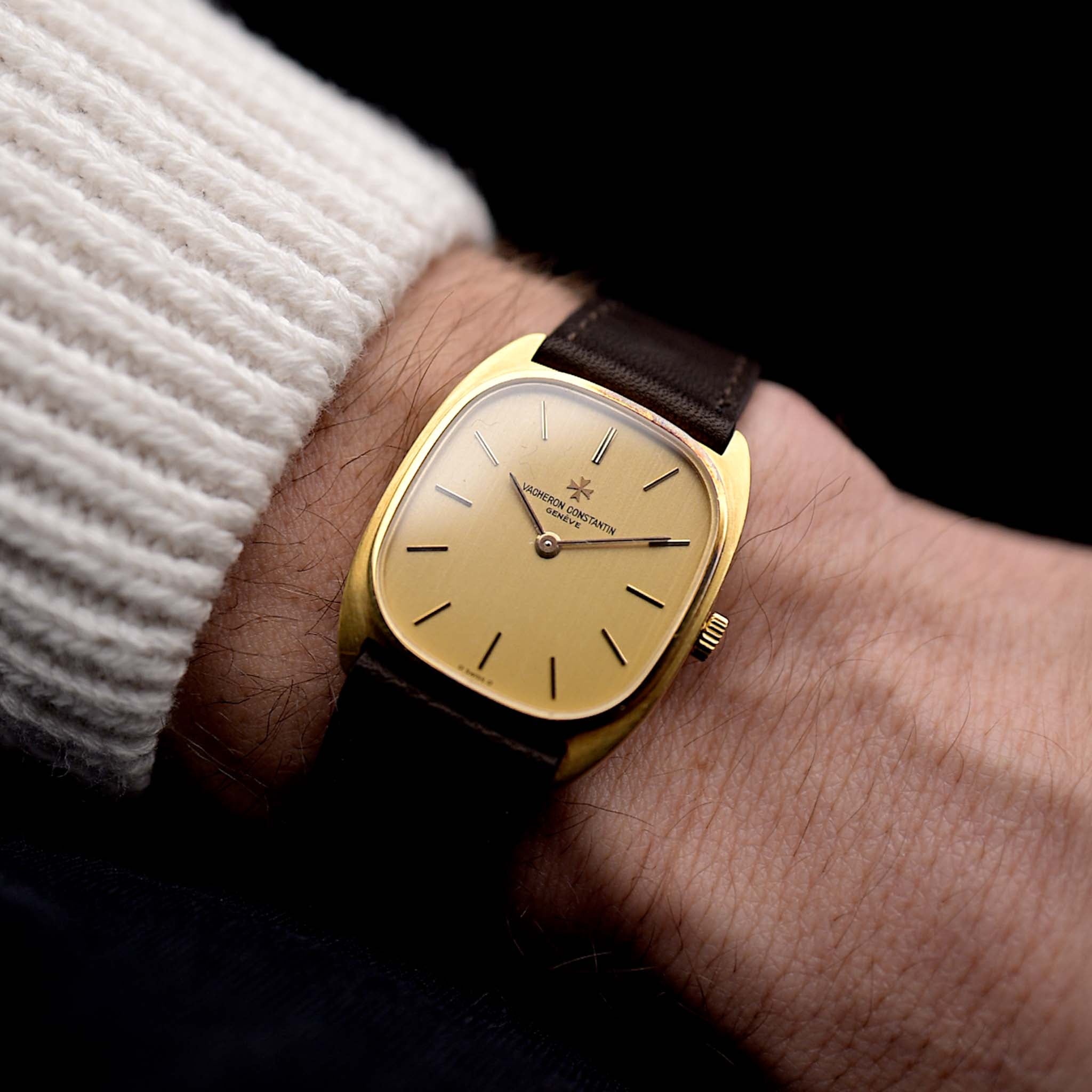 Photo of a Vacheron Constantin 39014 Tonneau 18k from the 1980s on a wrist. 27mm 18k yellow gold case with Manual wind movement, Original Sigma dial and Leather strap.