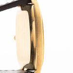 Closeup Photo of a Vacheron Constantin 39014 Tonneau 18k from the 1980s. 27mm 18k yellow gold case with Manual wind movement, Original Sigma dial and Leather strap.