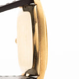 Closeup Photo of a Vacheron Constantin 39014 Tonneau 18k from the 1980s. 27mm 18k yellow gold case with Manual wind movement, Original Sigma dial and Leather strap.