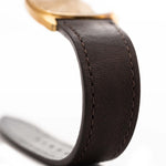 Closeup Photo of a Vacheron Constantin 39014 Tonneau 18k from the 1980s. 27mm 18k yellow gold case with Manual wind movement, Original Sigma dial and Leather strap.