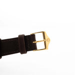 Closeup Photo of a Vacheron Constantin 39014 Tonneau 18k from the 1980s. 27mm 18k yellow gold case with Manual wind movement, Original Sigma dial and Leather strap.