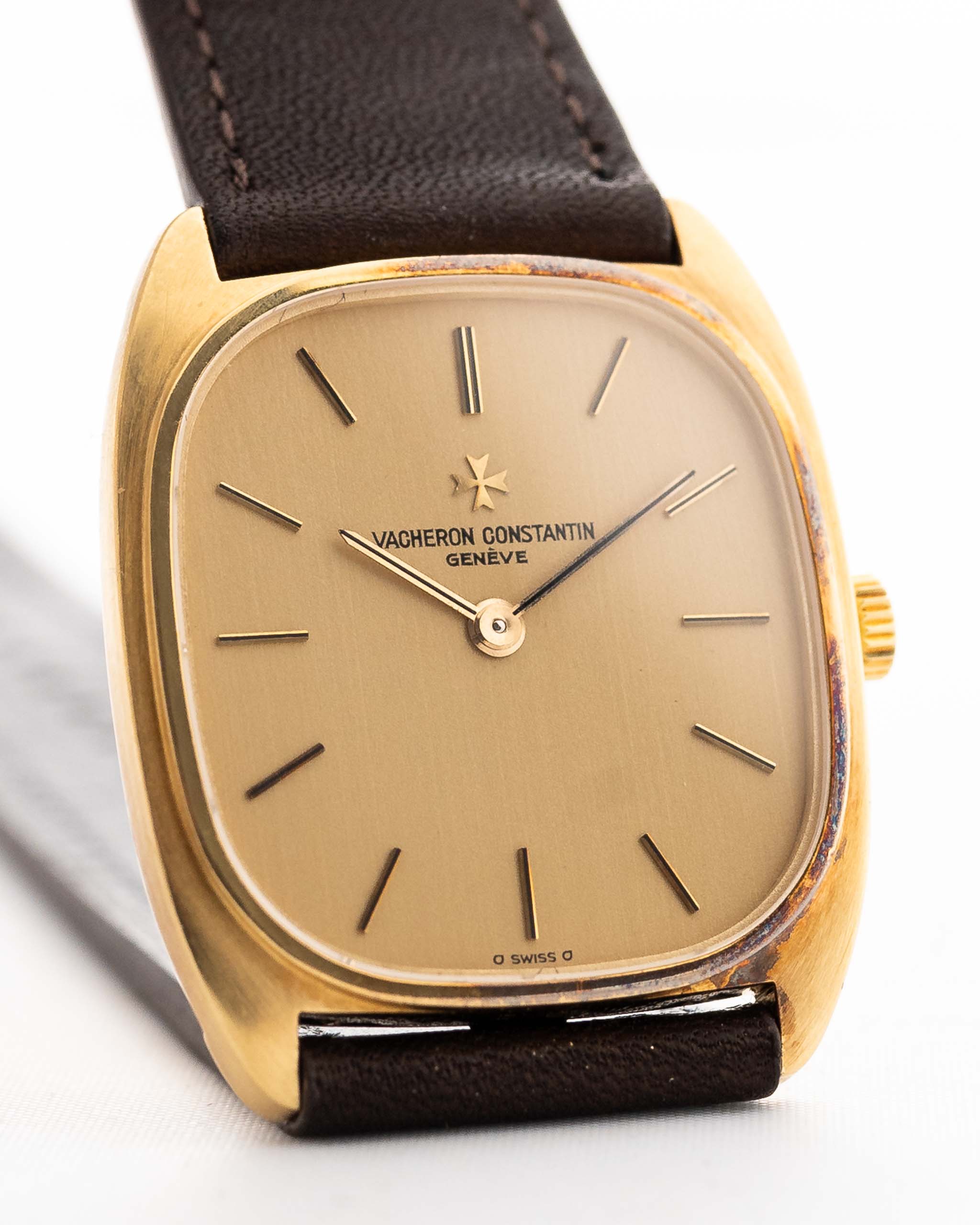 Closeup Photo of a Vacheron Constantin 39014 Tonneau 18k from the 1980s. 27mm 18k yellow gold case with Manual wind movement, Original Sigma dial and Leather strap.
