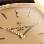 Closeup Photo of a Vacheron Constantin 39014 Tonneau 18k from the 1980s. 27mm 18k yellow gold case with Manual wind movement, Original Sigma dial and Leather strap.