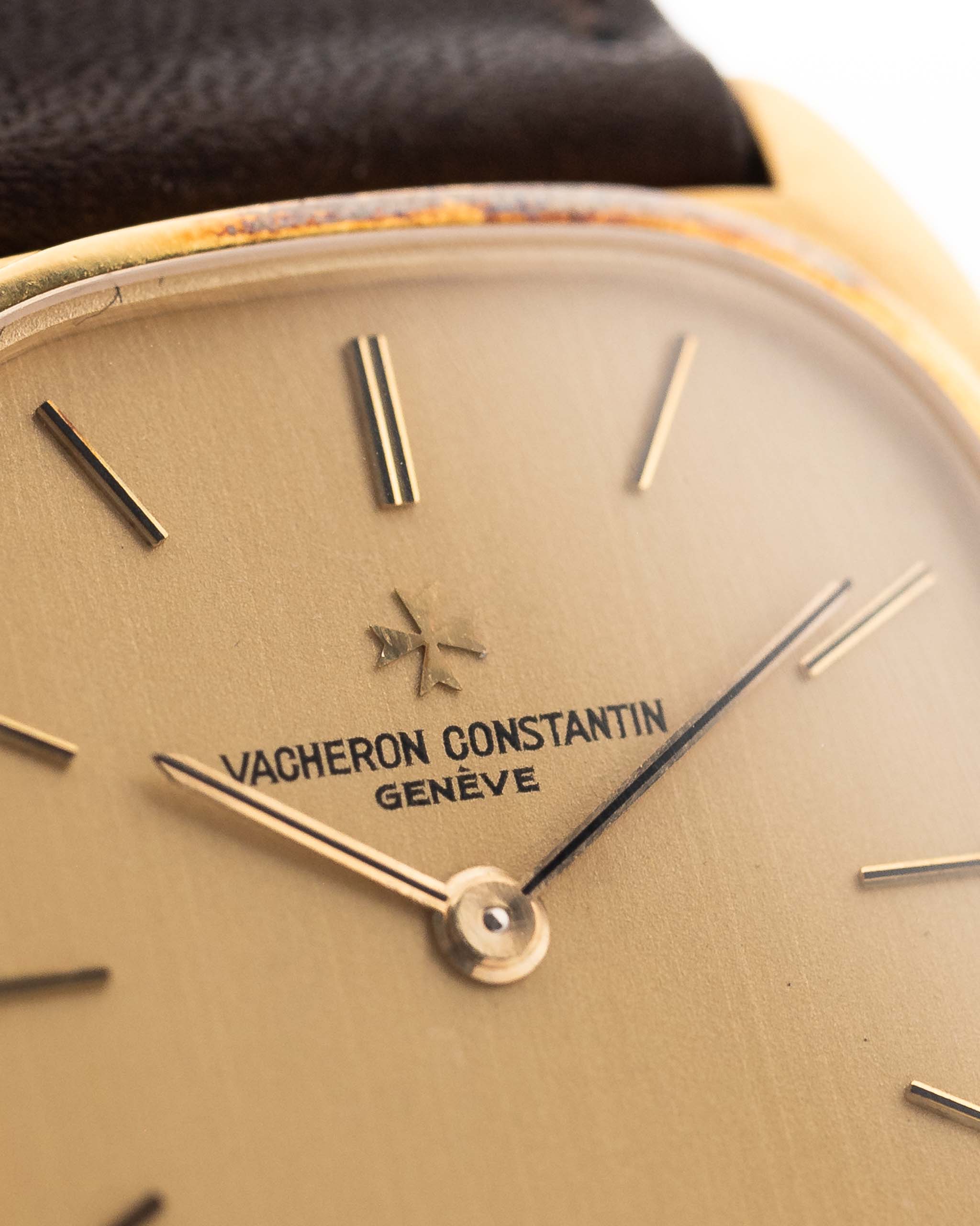 Closeup Photo of a Vacheron Constantin 39014 Tonneau 18k from the 1980s. 27mm 18k yellow gold case with Manual wind movement, Original Sigma dial and Leather strap.