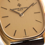 Closeup Photo of a Vacheron Constantin 39014 Tonneau 18k from the 1980s. 27mm 18k yellow gold case with Manual wind movement, Original Sigma dial and Leather strap.