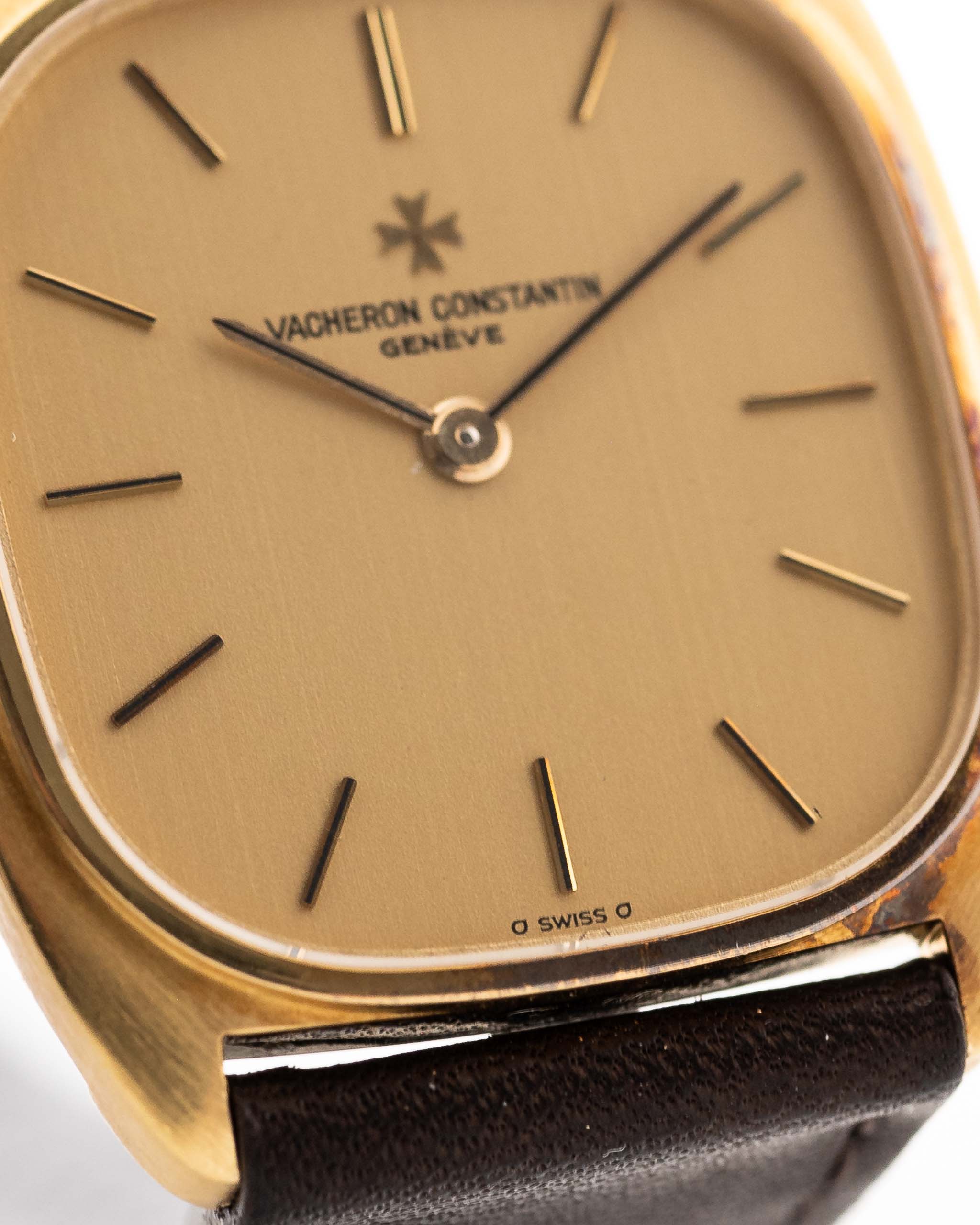 Closeup Photo of a Vacheron Constantin 39014 Tonneau 18k from the 1980s. 27mm 18k yellow gold case with Manual wind movement, Original Sigma dial and Leather strap.