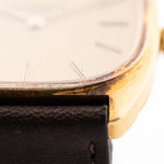 Closeup Photo of a Vacheron Constantin 39014 Tonneau 18k from the 1980s. 27mm 18k yellow gold case with Manual wind movement, Original Sigma dial and Leather strap.